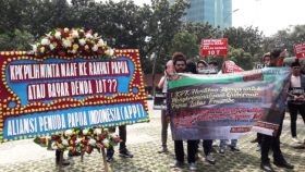 Didenda Adat Rp 10 T, KPK Dituntut Pemuda Papua Minta Maaf