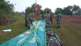 Banner Terpasang Upacara Pembukaan TMMD Siap Digelar, Kami Senang