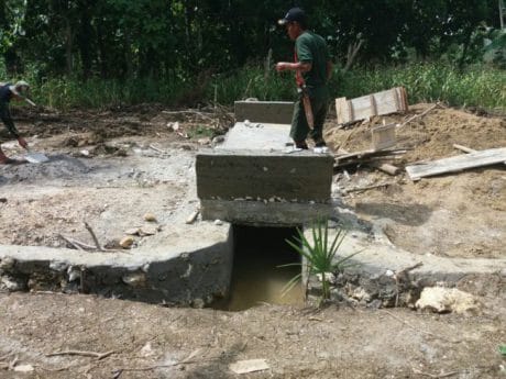 KETERLIBATAN TNI POLRI DALAM KEGIATAN PROGRAM TMMD