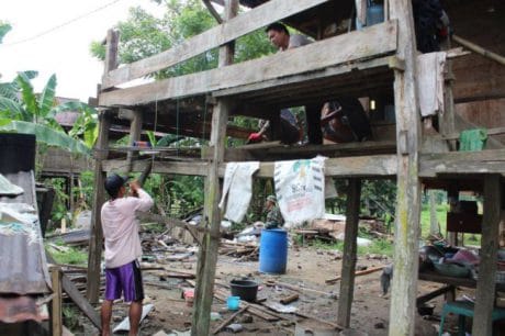 Dengan dibantu warga setempat, rumahnya mulai direhab oleh Satgas