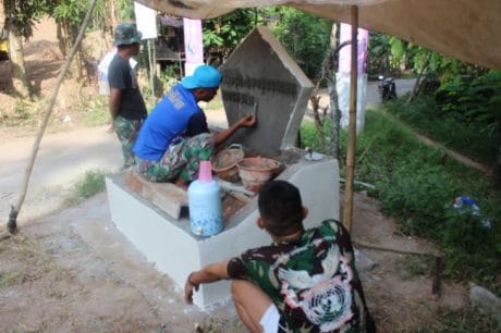 Tugu TMMD ke-104 dalam proses penyelesaian