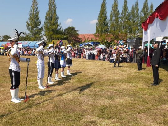 Mayoret Marching Band PKTJ Laporan Pada Wabup