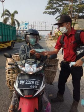 Asian Agri, Bagikan Masker Gratis ke Warga dan Murid Sekolah di Pangkalan Kerinci