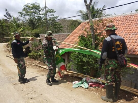 JELANG PENUTUPAN TMMD REG 106 KODIM 0818, UMBUL-UMBUL MULAI DI PASANG