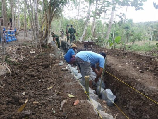 MEMINIMALISIR TERJADINYA LONGSOR, TANGGUL PENAHAN TANAH DIBUAT SEKOKOH MUNGKIN OLEH SATGAS TMMD