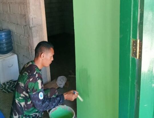 SATGAS TMMD 106 BUATKAN PINTU BERNUANSA HIJAU TNI