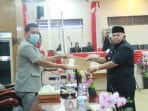 Bupati Safrial Sampaikan Nota Pengantar Ranperda Penegakan Protokol Kesehatan