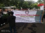 Demo Usut Tuntas Dana Bansos Covid-19