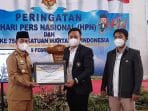 HPN 2021, Bupati Lampura Terima Penghargaan Tjindarboemi