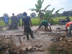 Satgas TMMD Lakukan Kegiatan Pembangunan Jalan Lingkungan Menggunakan Pavingnisasi