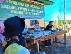 Ir. H.Bismark Muaratua Siregar Berikan Tips Pemilihan Bibit Buah Berkualitas di TMMD Kodim Tapsel