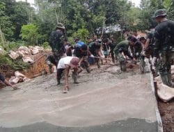 Kekompakan Tim Satgas TMMD dan Warga Melakukan Pengecoran Jalan