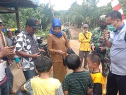 Peduli Corona, Satgas TMMD ke 111 Kodim 0212/TS Bagikan Masker