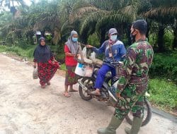 Penjual Sayur Keliling Nikmati Jalan Hasil Karya Program TMMD Ke-111 Kodim 1207/Pontianak