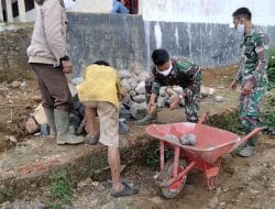 Tetap Kompak, Giat langsir Batu Penahan Tebing Jalan Baru di TMMD Kodim Tapsel