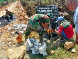 Tugu Prasasti atau Monumen TMMD Dikerjakan Tanda TMMD Mendekati Tahap Akhir