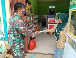 Satgas TMMD Ke-111 Kodim 1207/Pontianak Bagikan Masker Gratis Kepada Warga Setempat