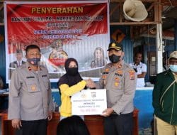 Polres Paniai Salurkan Bantuan Sosial untuk PKL dan Warung
