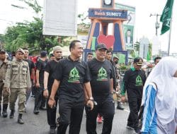 Ribuan Peserta Gerak Jalan Santai Meriahkan HUT Al-Jamiyatul Wasliya